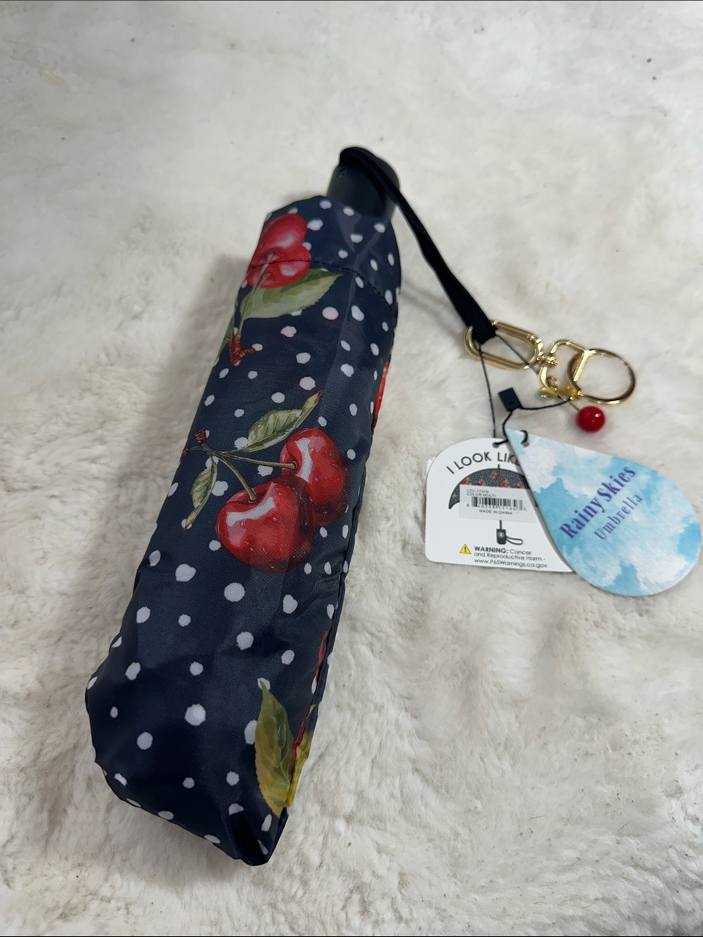 Rainy skies navy  blue with cherries umbrella